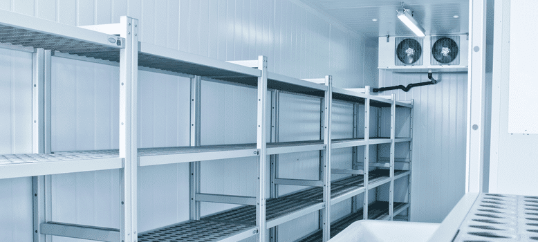 Inside shot of an empty commercial refrigerator.