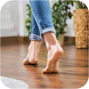 lady walking barefoot on her radiant heated flooring