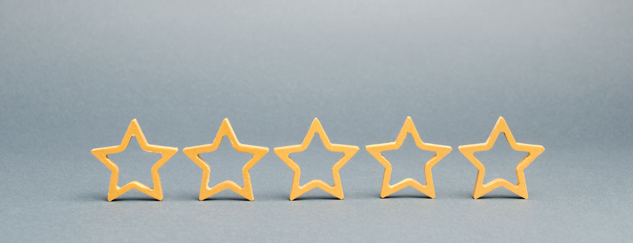 five stars on a gray background