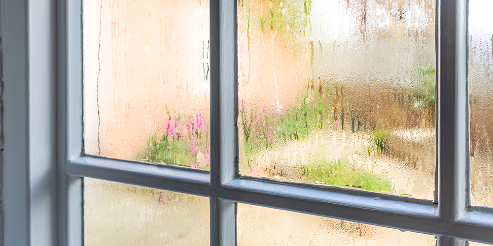 High humidity inside home creates moisture on windows.